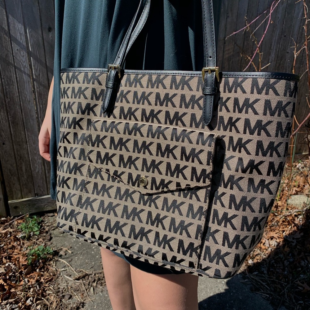 Beige and black Michael Kors bag